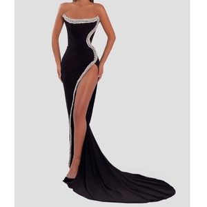 Albina Dyla black dress